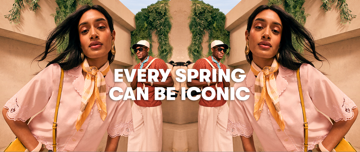 Two mirrored images show a person in a light matching outfit with a scarf, crossbody bag and jewellery, set against a beige architectural backdrop with green foliage. Another person in the background wears a patterned top, wide light trousers, a scarf, sunglasses, a brimmed cap and a crossbody bag. The text “EVERY SPRING CAN BE ICONIC” appears across the centre.