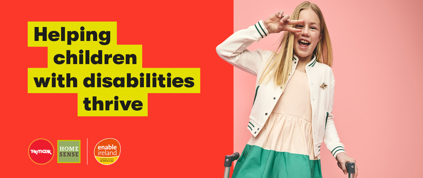 A smiling girl holds a walking frame while making the peace sign with her right hand over her eye, alongside the headline ‘Helping children with disabilities thrive’.